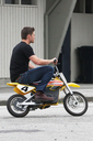 jensen-ackles-jared-padelecki-mini-bike-supernatural-set-09152011-01.jpg